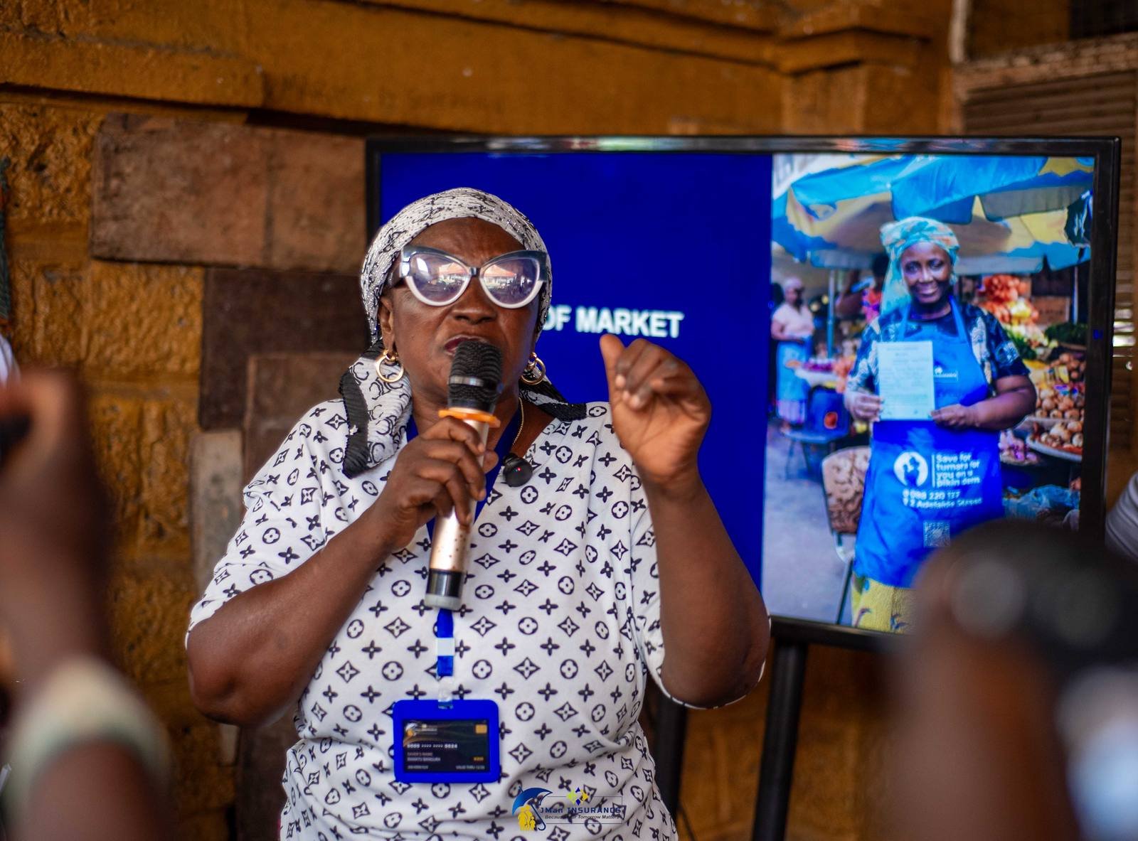 Ramatu Bangura answers on behalf of the market women. She is a Kombra saver herself.